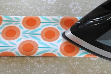 Fold and press the waistband in half