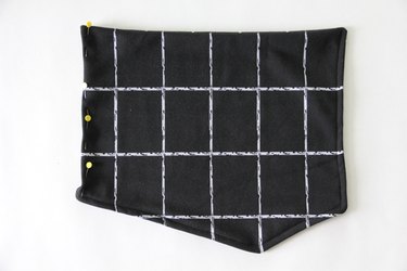 turn open edge towards wrong side and sew