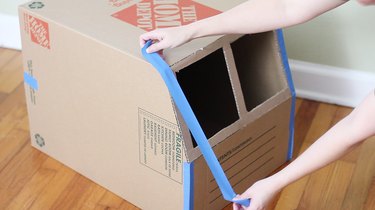 Taping windshield in place
