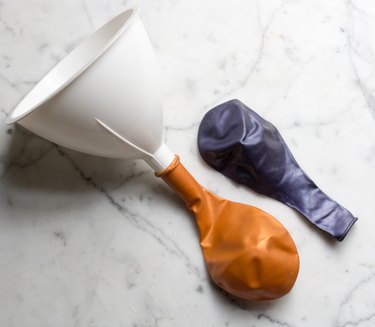 Funnel with balloon attached to the neck