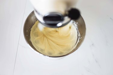 Mixing the cream cheese glaze.