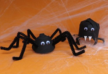 Create fake spiders with egg cartons and paper towel rolls