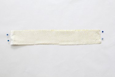Pin waistband right sides together and sew side seam