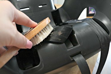 Scrubbing child's car seat