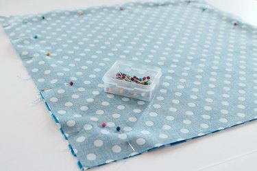 pin in place with an opening at the bottom