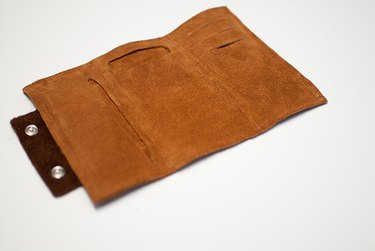inside wallet with slits for phone and credit cards