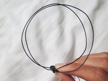 Gauging the size for the second wire ear.