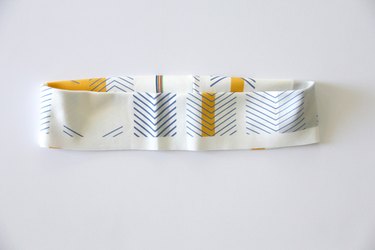 Fold waistband in half