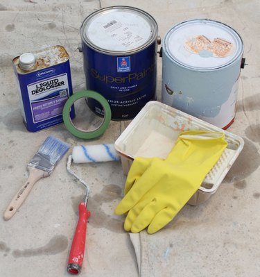Supplies for painting an interior door.