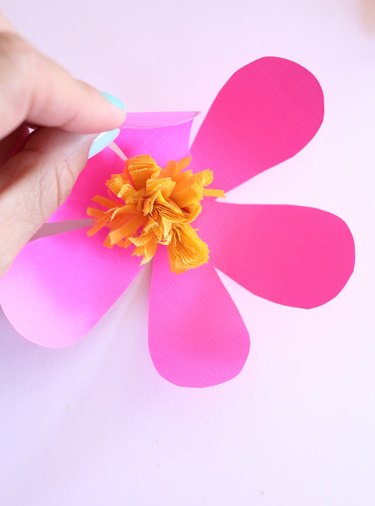 Cup paper towards center of flower.