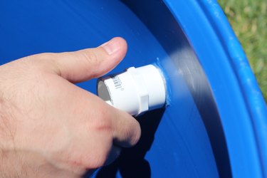 Attaching the adapters inside the barrel.