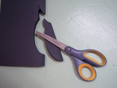 Go slowly so the papers on the bottom do not move.