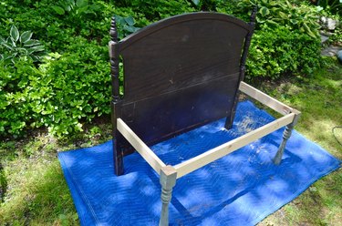 legs and support beams attached to headboard