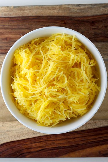 Shredded spaghetti squash in a casserole dish.