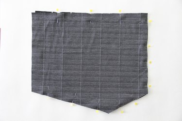 Sew asymmetrical wrap skirt front together