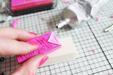 attaching stamp to block