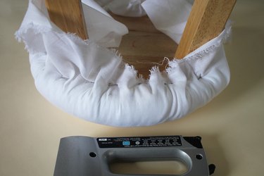 Secure the layer of fabric.