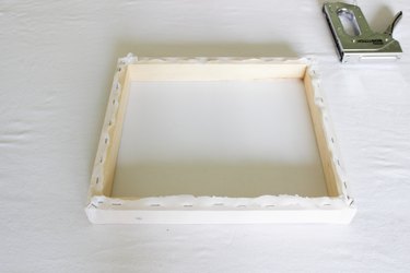 Screen stapled to wooden frame