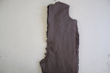 Do not sew the center back closed above the notch.