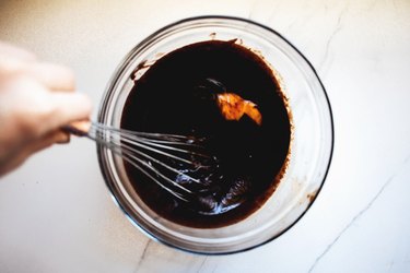 The mixture will be thick and glossy when the eggs have been incorporated.