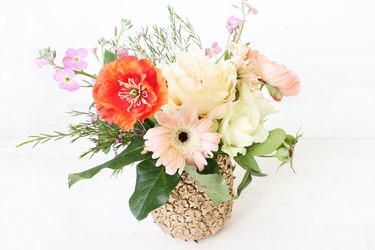 Make a pineapple into a flower vase