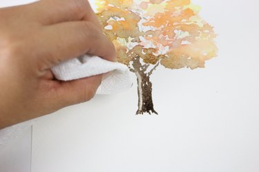 Lifting paint off the tree trunk