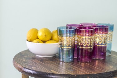 This handmade wooden bar cart is the perfect place to display your favorite glasses.