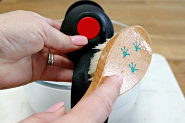 Scrubbing child's car seat strap