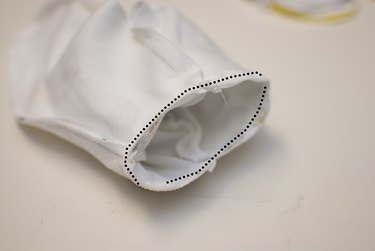 Sew head and bodice together.