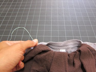 Tuck fabric into collar