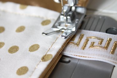 Sew along the edges of the folded section.