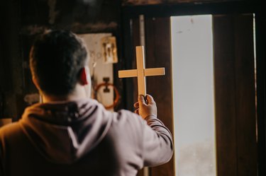 Religious carpenter in work shop