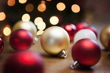 Christmas baubles on table.