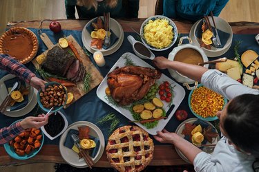 Stuffed turkey for Thanksgiving with other popular accompanying dishes
