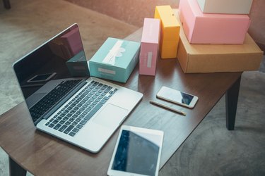 Shipping shopping online,laptop computer at workplace of start up.
