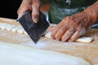 Midsection Of Man Preparing Food