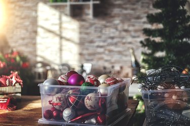 Decorating Christmas Tree with Ornaments and Christmas Lights