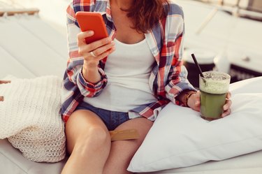 Shopping online with credit card on a vacation