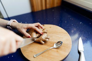 Cutting fresh ginger root