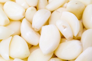 Full Frame Shot Of Peeled Garlic