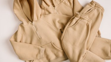 Children's tracksuits on a white background, advertising