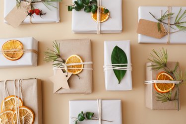 Christmas handmade presents and gifts on beige background.