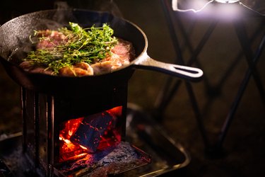 Sizzling steak in a cast-iron skillet
