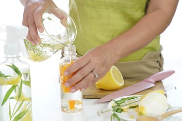 Infusing vinegar with fruit peels in spray bottle