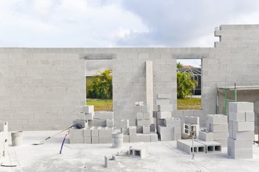 Foundation and brick wall at a construction site