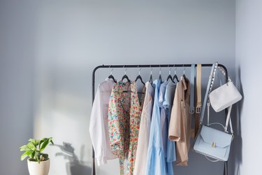light colored womens summer clothes on hanger
