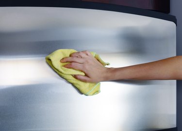 Polishing exterior of stainless steel refrigerator