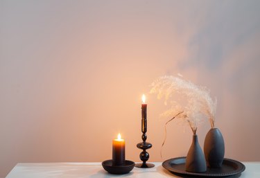 home decor with dried flowers and burning candles