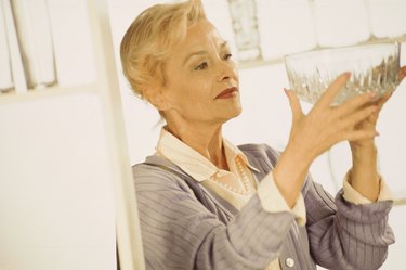 Woman shopping for glassware