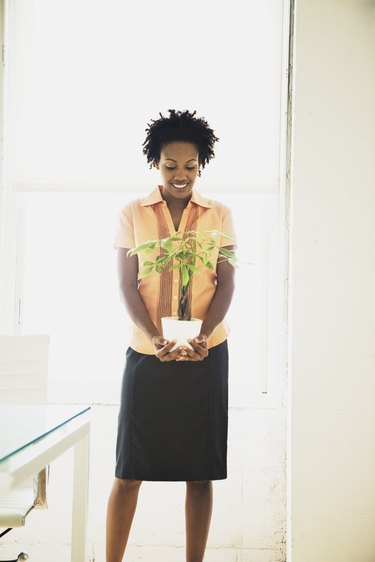 Smiling woman standing in office